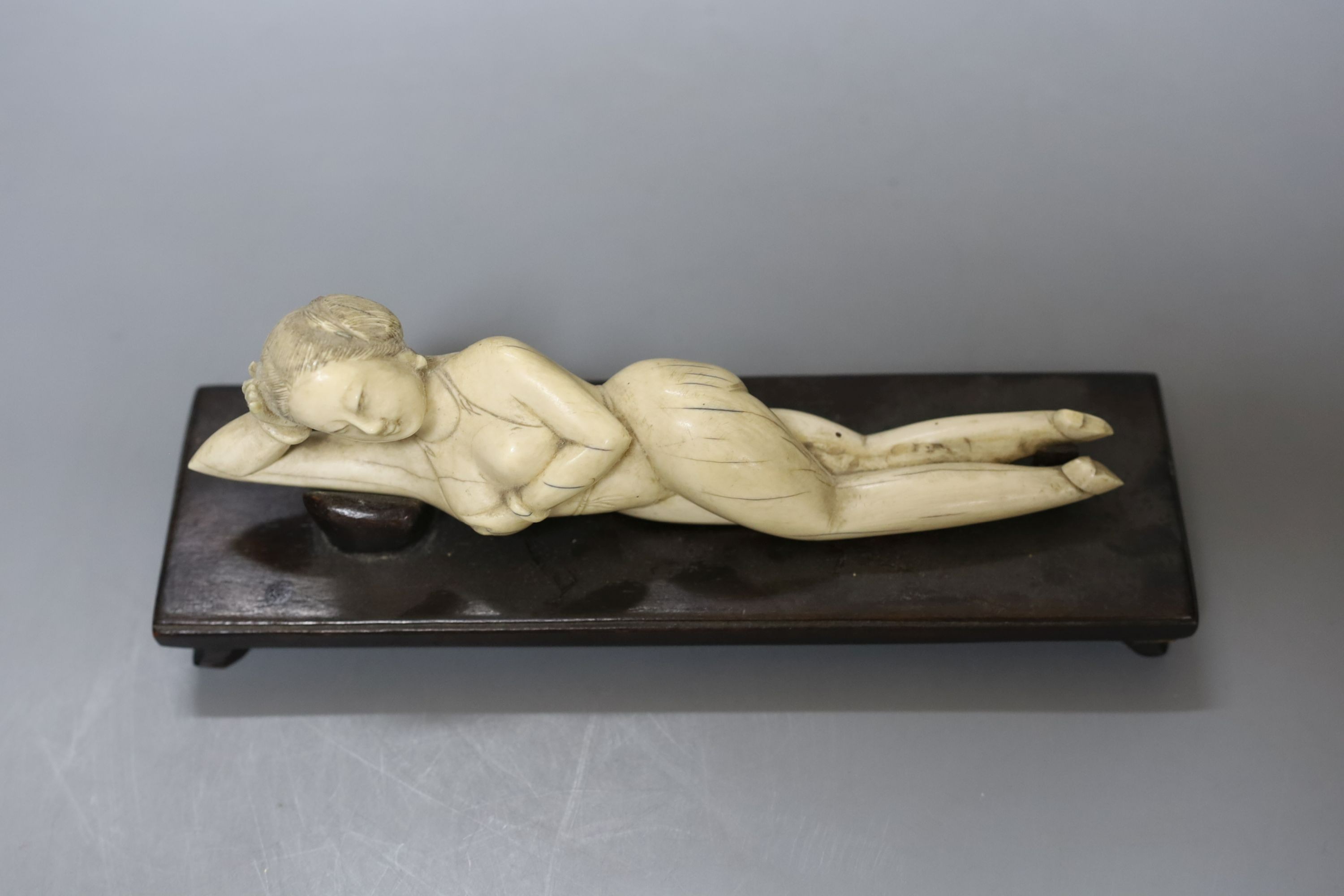 A Chinese ivory female nude medicine figure, on plinth, 19th century, 20cm